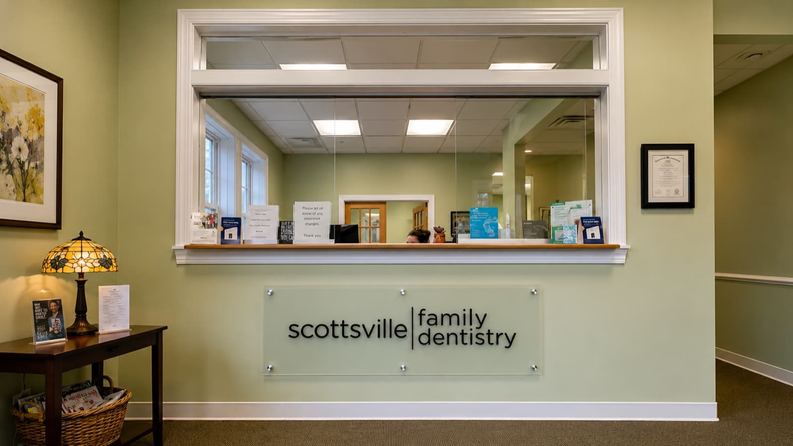 Reception desk and waiting area inside Scottsville Family Dentistry